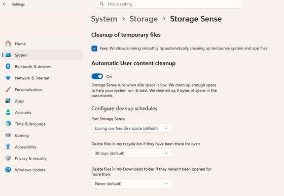 Windows 11 Storage Sense settings showing the Downloads folder auto-delete option