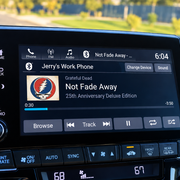 Jerry’s Work Phone Music Dashboard Car infotainment screen connected to a personal phone labeled Jerry’s Work Phone, illustrating personal smartphone use for work and BYOD security.